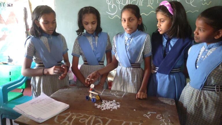 Students engaged in hands-on science activity